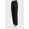 Black button-down jeans with embroidery