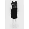 Dress with leather insert and metal appliqué
