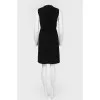 Dress with leather insert and metal appliqué