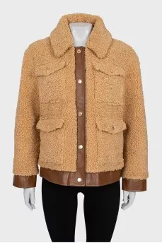 Jacket with patch pockets and tag