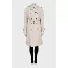 Double-breasted white trench coat