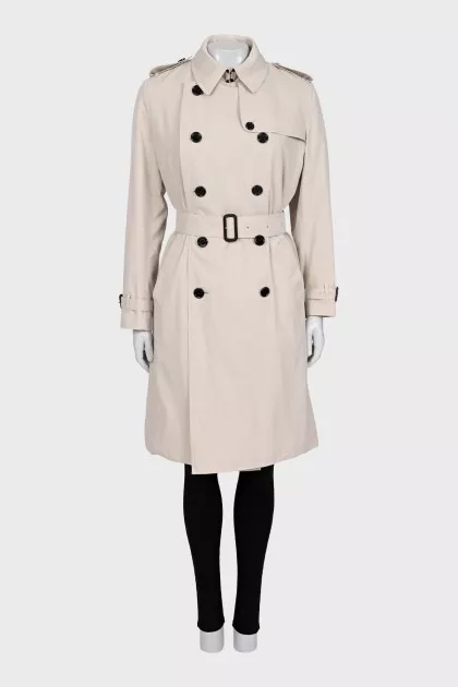 Double-breasted white trench coat