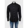 Men's black shirt with white buttons
