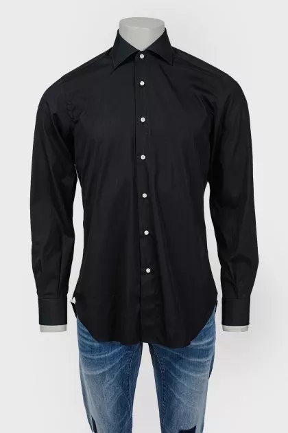 Men's black shirt with white buttons