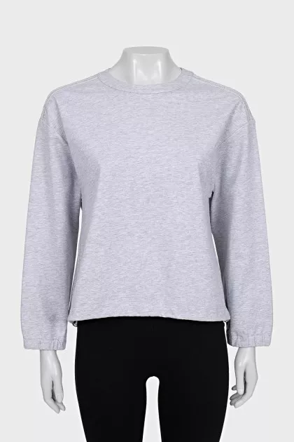 Gray sweatshirt decorated with beads