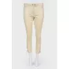Trousers with decorative lacing