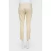 Trousers with decorative lacing