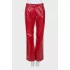 Red trousers with embossed leather