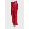 Red trousers with embossed leather