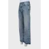 Men's blue jeans with a distressed effect