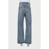 Men's blue jeans with a distressed effect