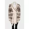 Knitted cardigan with a geometric print