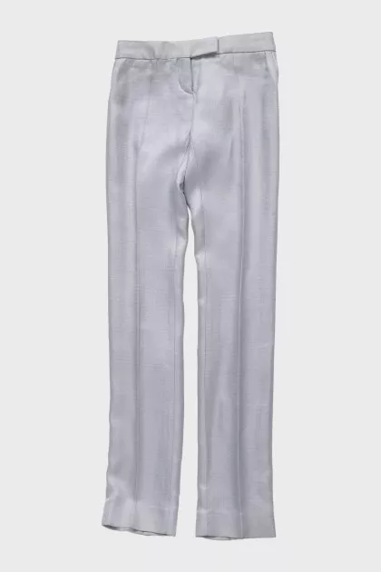 Silver trousers with creases