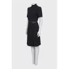 Black dress with gold trim on the belt