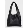 Leather bag with a gold lock