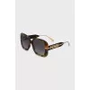 Sunglasses with a gold logo