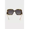 Sunglasses with a gold logo