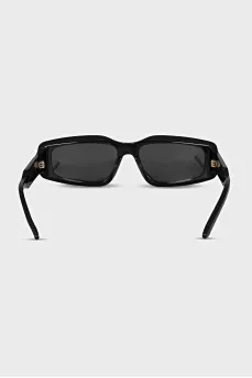 Black sunglasses with gold logo