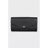 Black leather wallet with branded embossing