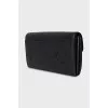 Black leather wallet with branded embossing