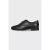 Black lace-up shoes