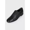 Black lace-up shoes