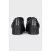 Black lace-up shoes