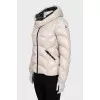 White fitted down jacket with a zipper