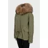 Parka with pockets decorated with fur