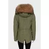 Parka with pockets decorated with fur