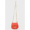 Bag on a chain with a swivel lock