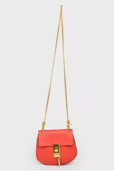Bag on a chain with a swivel lock
