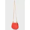 Bag on a chain with a swivel lock