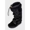 Insulated boots decorated with fur