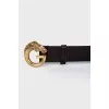 Brown belt with gold buckle