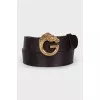 Brown belt with gold buckle