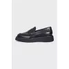 Black leather loafers