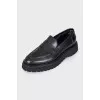 Black leather loafers