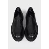 Black leather loafers