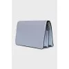 Blue leather bag with silver logo