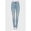 Skinny jeans with a patch on the pocket