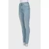 Skinny jeans with a patch on the pocket