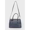 Blue bag with interior decoration of red leather