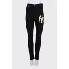 High-waisted jeans with embroidery