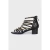 Leather sandals with chains