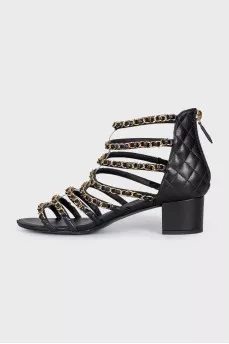 Leather sandals with chains