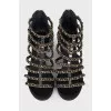 Leather sandals with chains