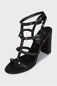 Sandals with leather straps and studs