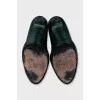 Green snakeskin embossed shoes