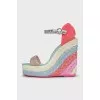 Leather and textile sandals with a woven wedge heel
